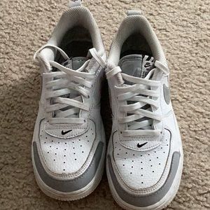 Worn kids Nike Air Force ones
